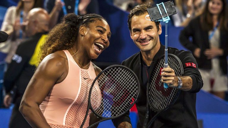 Federer wins in historic clash with Serena