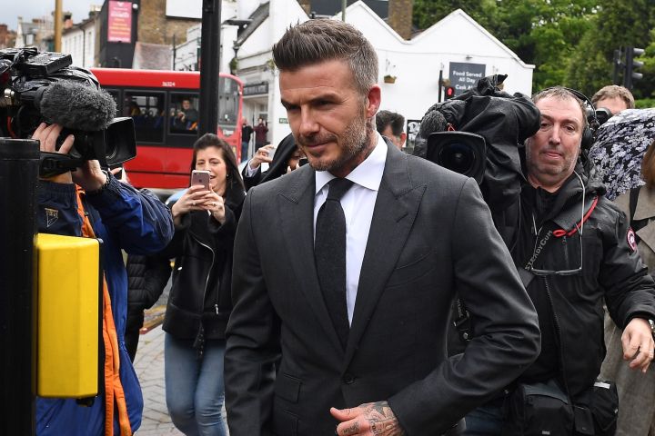 Beckham gets 6-month driving ban for using phone