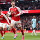 Arsenal overcome Burnley to closing-in on title